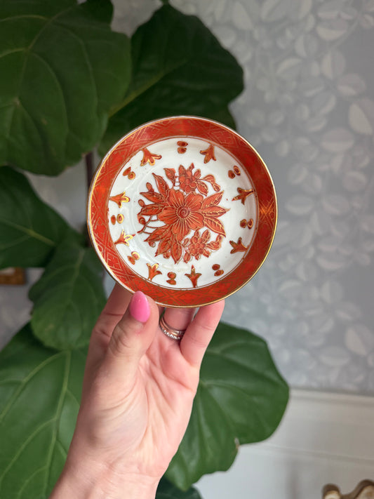 Rust colored, floral trinket dish