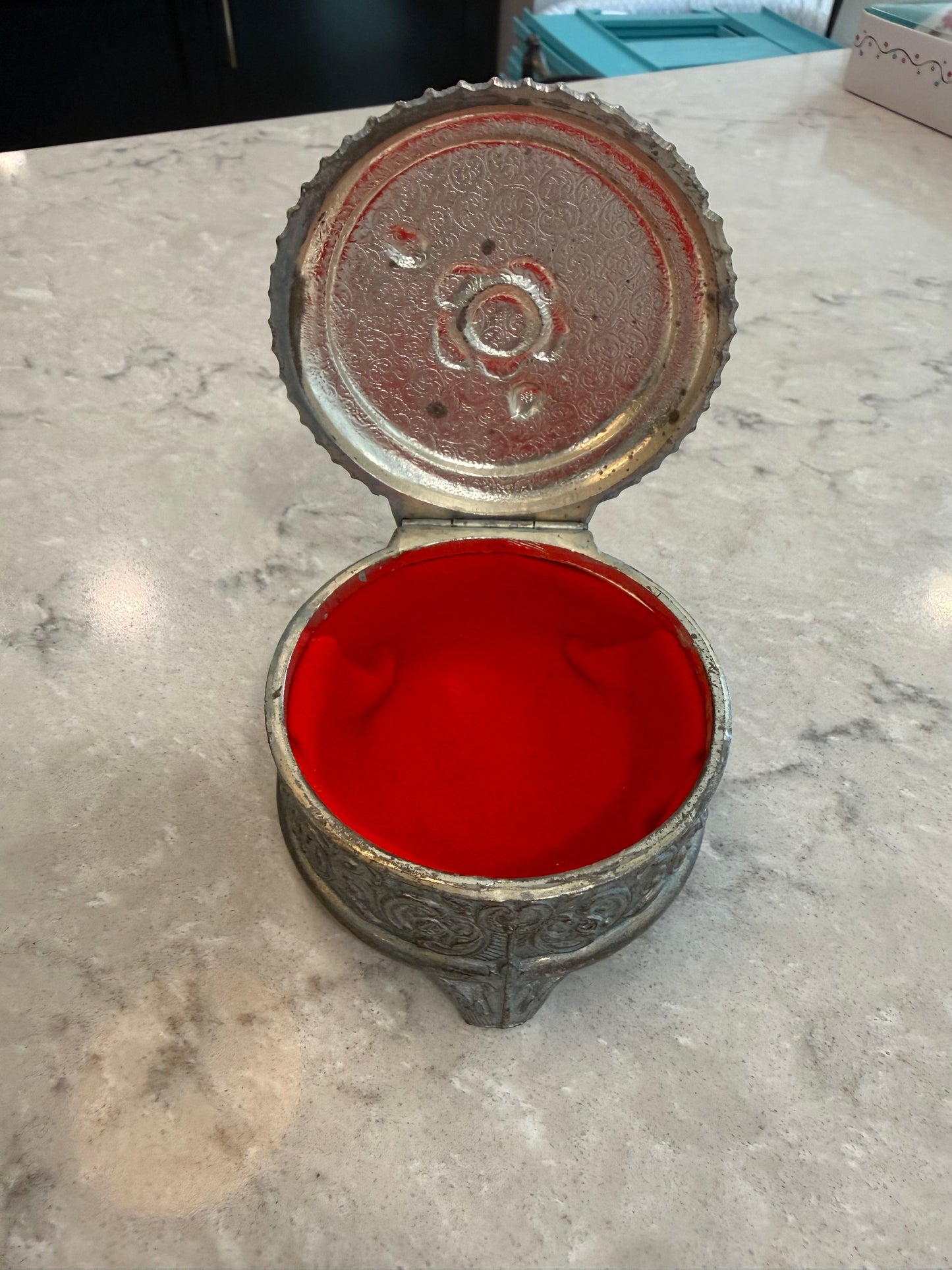Metal trinket box with floral design