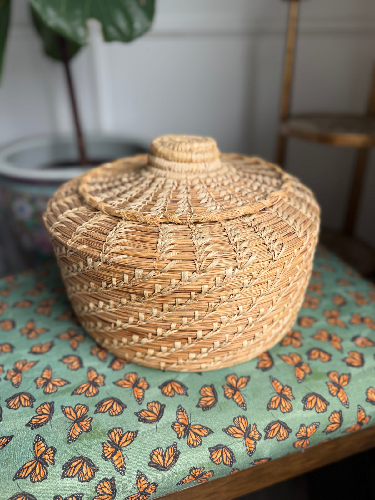 Woven lidded basket