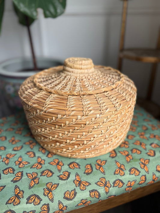 Woven lidded basket